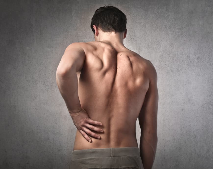 Person experiencing back pain